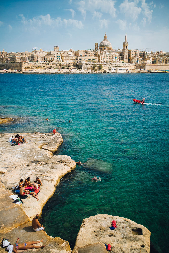 Swimming on the rocky beaches in Sliema